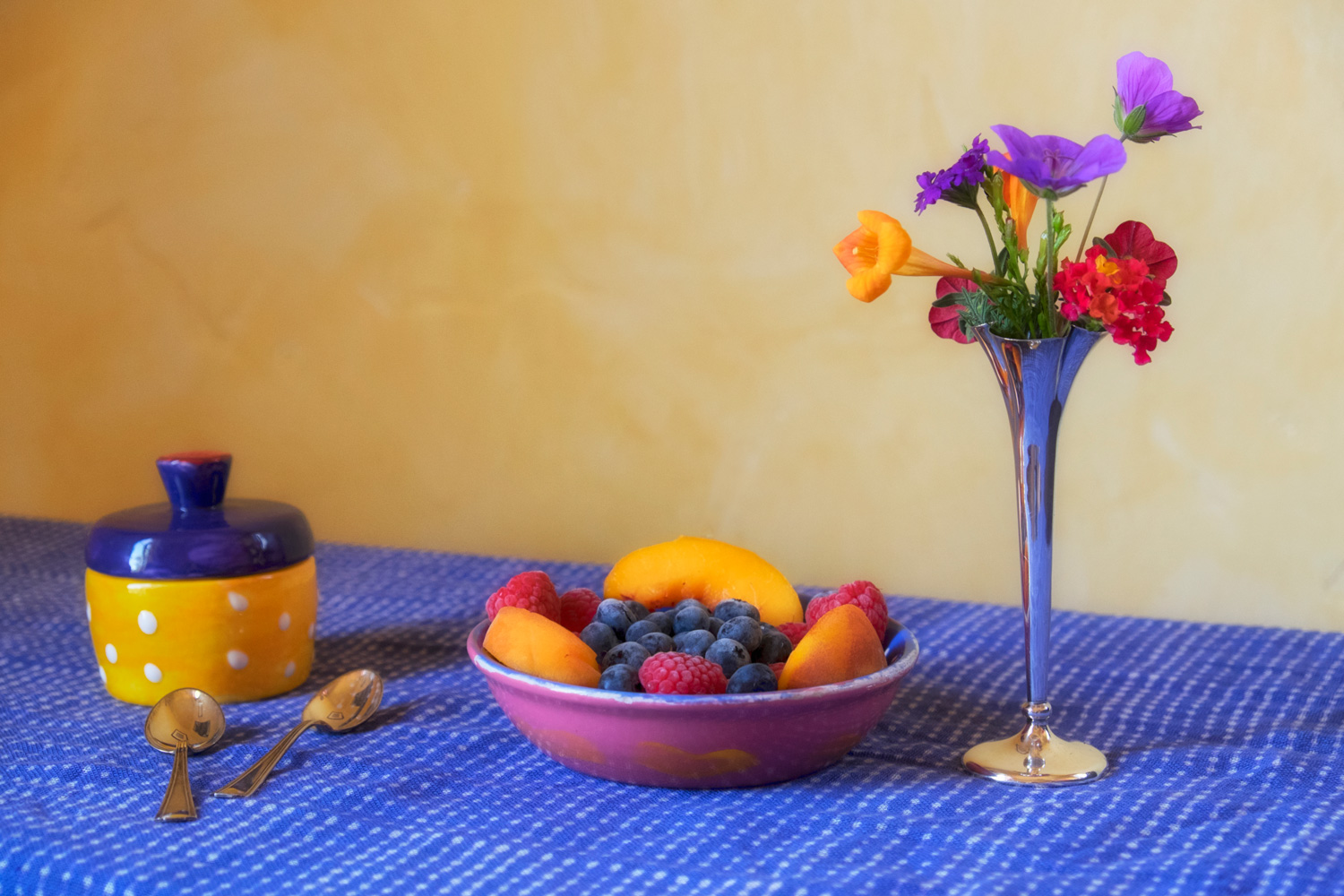 Colorful Fruit and flowers on a table